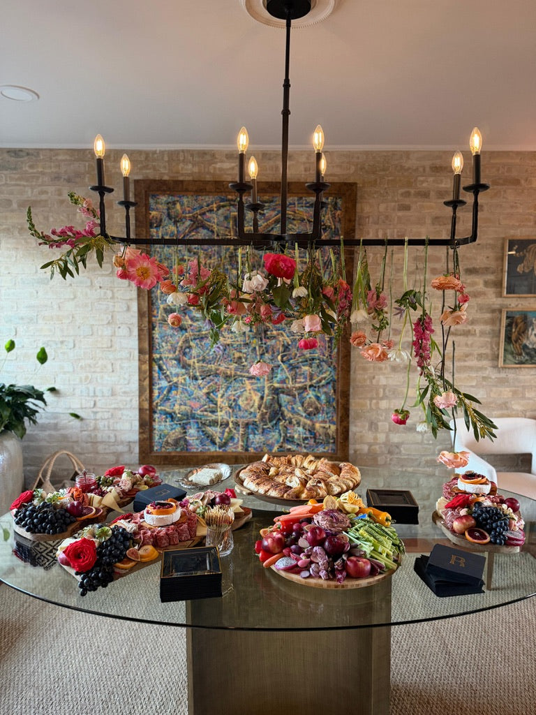 hanging flower installation over dining table