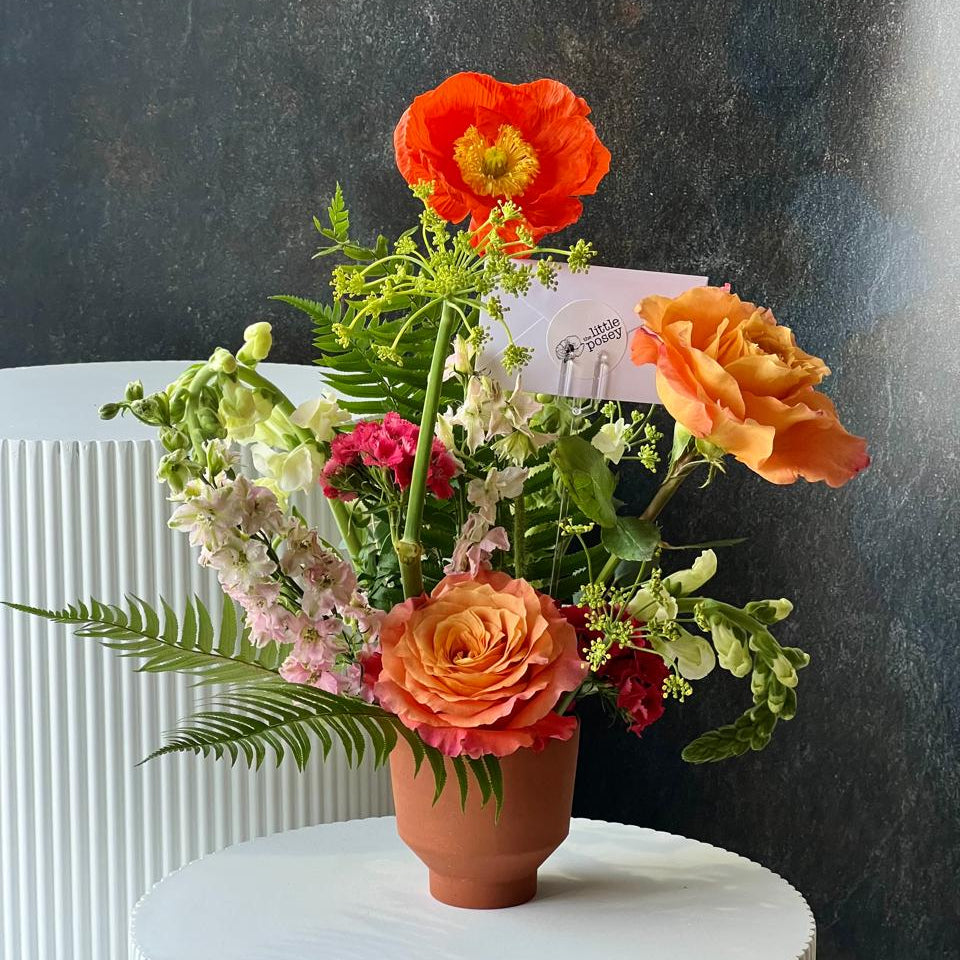 Little Posey with a Vase with local poppy flowers austin texas