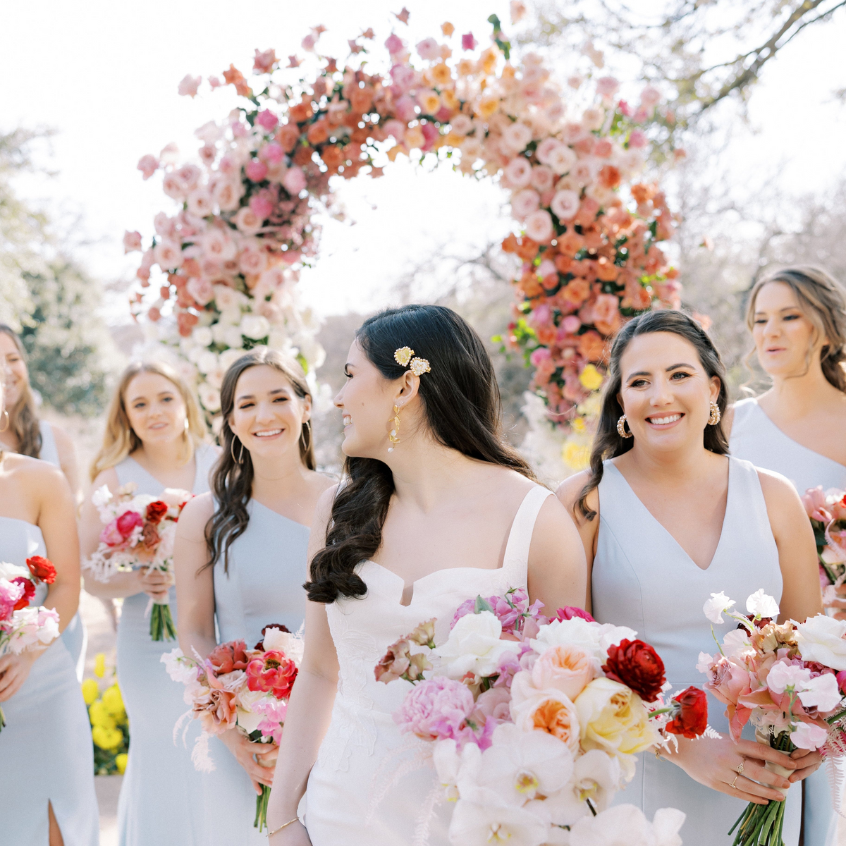 Bride and bridesmaids at Four Seasons Austin Wedding Posey Floral Bouquets