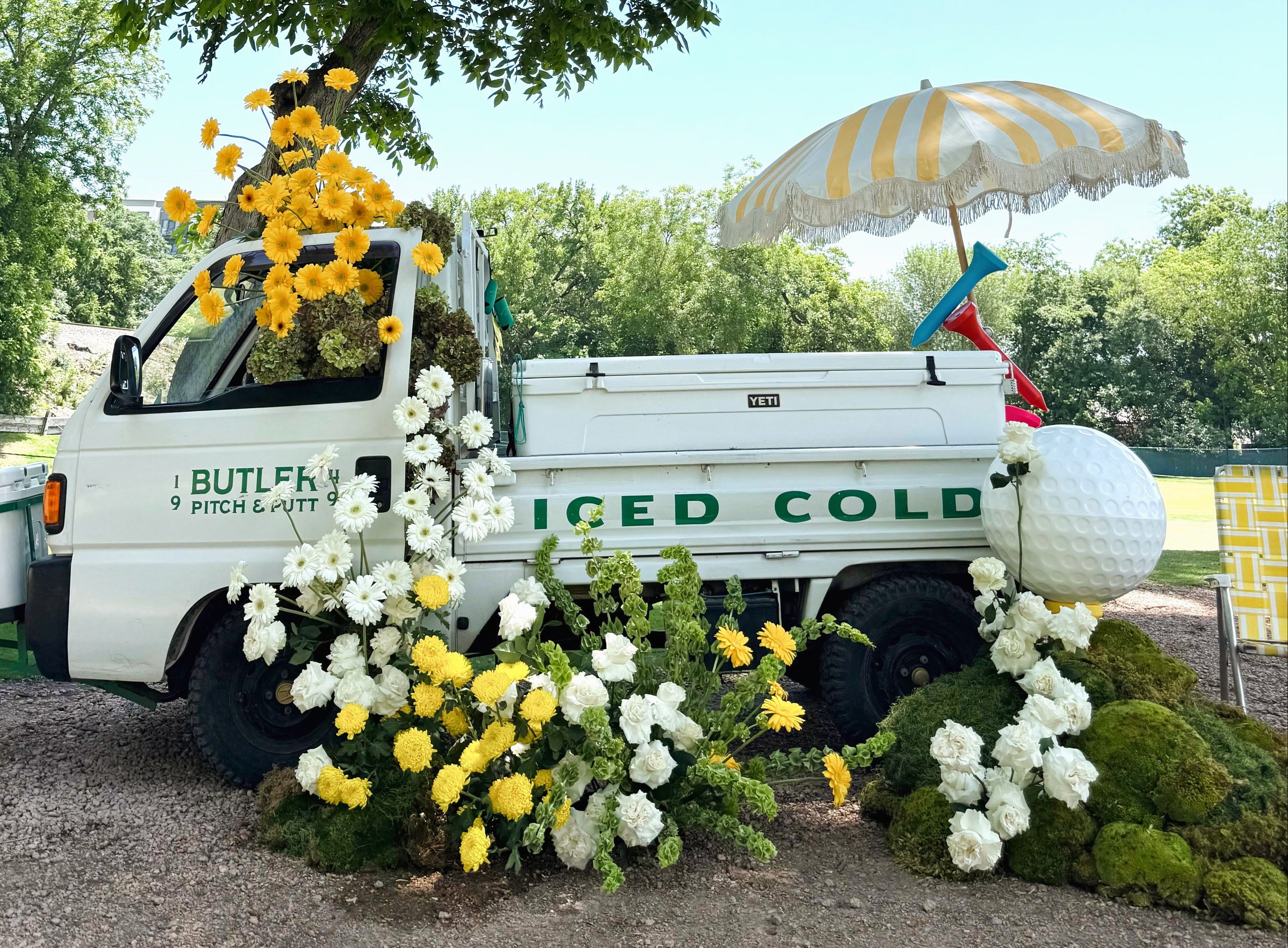 golf activation with florals by posey floral butler pitch n putt