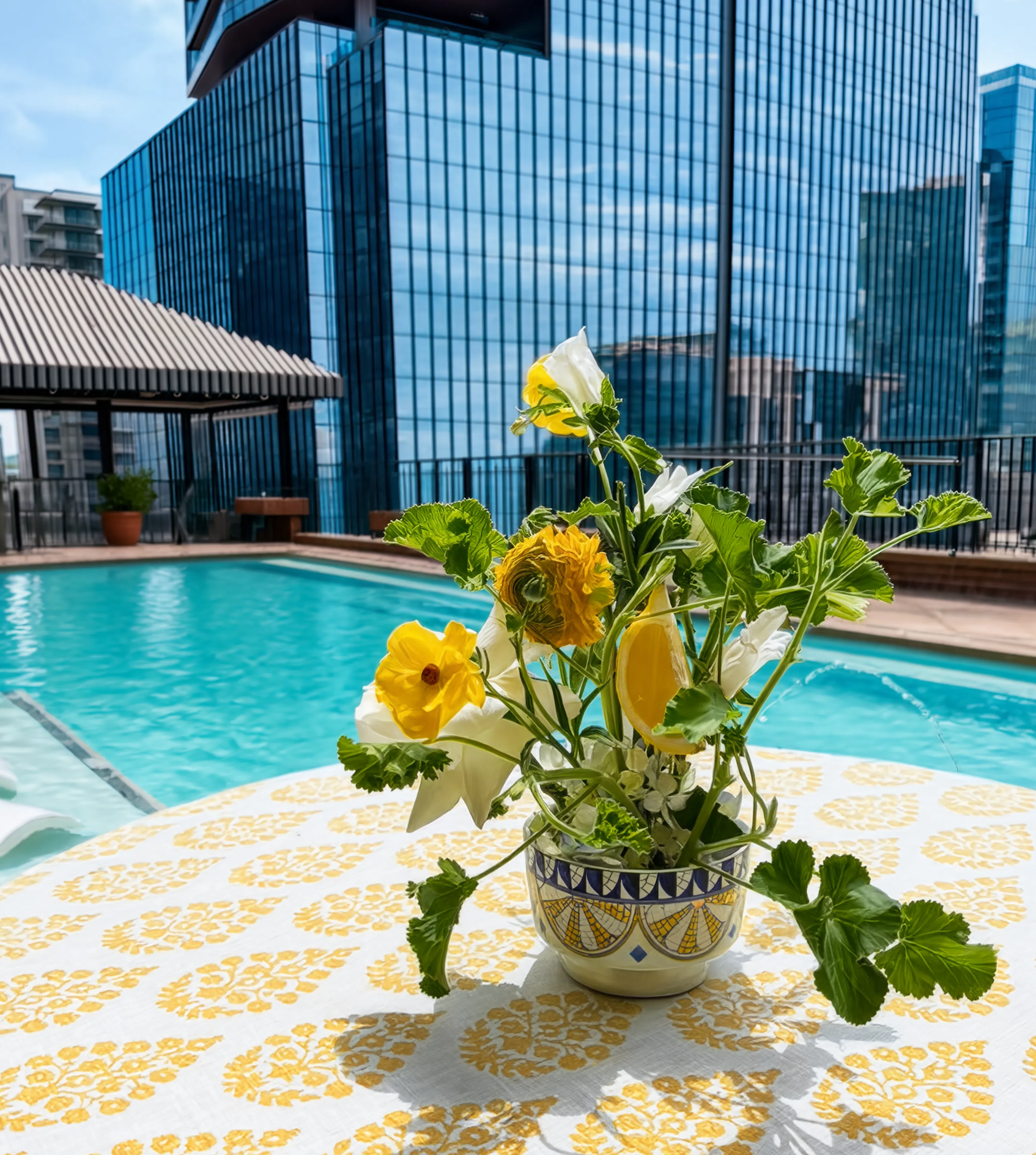 hotel floral subscription yellow green poolside